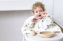 Lade das Bild in den Galerie-Viewer, Bibado Coverall Weaning Bib with Ecomm Bag: Spaghetti Serengeti Print
